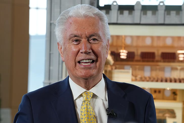 President Dieter F. Uchtdorf speaking during the dedication of the Temple Square Visitors’ Center, emphasizing openness about LDS temples.