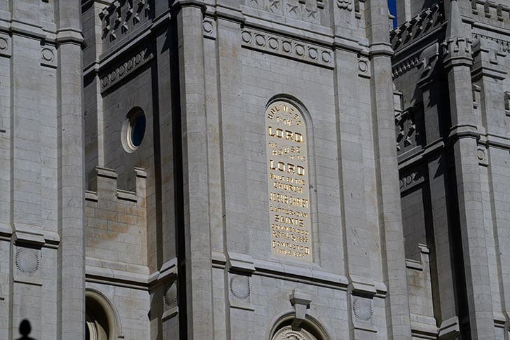 Close-up of the Salt Lake Temple exterior inscription “Holiness to the Lord,” symbolizing the sacred purpose of LDS temples.