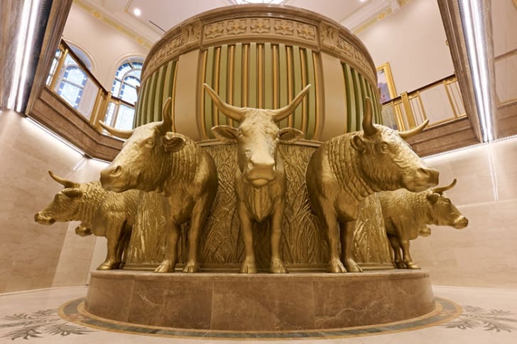 Temple baptismal font supported by twelve oxen, symbolizing sacred ordinances in the Church of Jesus Christ of Latter-day Saints and temple worship.