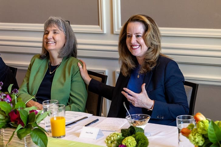 International Organization for Migration Director Amy Pope participates in a meeting with Church representatives discussing migrant support and humanitarian partnerships.