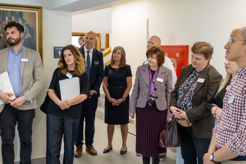 Community leaders and guests tour a Church meetinghouse in Athens, Greece, during an open house designed to build understanding and strengthen relationships.