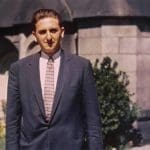 Young Thomas Monson standing outside a Church building, connected to Gathering Israel, missionary testimony, and the Restored Gospel.
