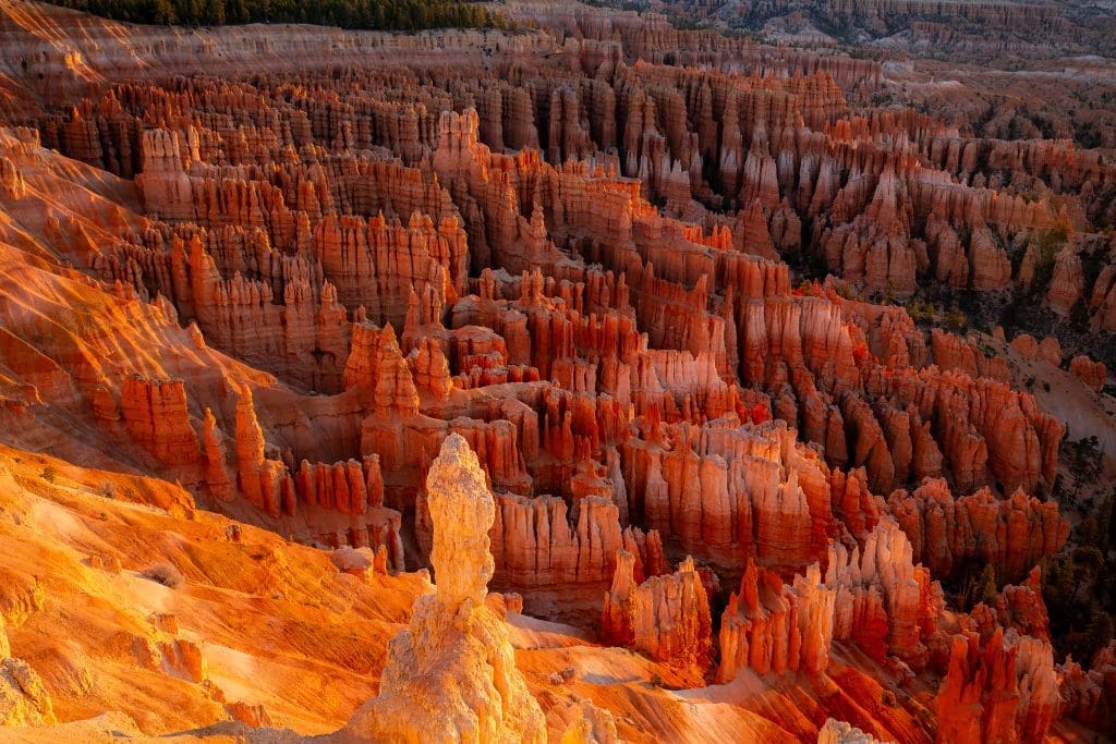 Sunlight pours across the towering red hoodoos of Bryce Canyon during the early stages of the Ocean to Ice expedition, where Mike Loveridge reflects on Machu Picchu, prayer, spiritual clarity, and learning to act on clear answers from God while preparing for the rugged backcountry miles ahead.