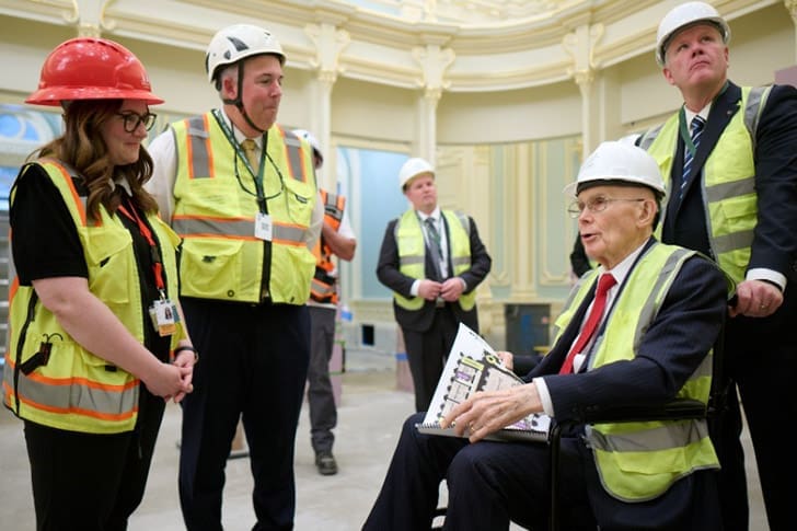 President Dallin H. Oaks tours the nearly completed Salt Lake Temple renovation with Church leaders and construction workers during a First Presidency preview of the historic temple project.