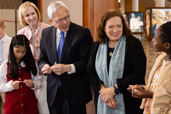Elder Gerrit W. Gong, Susan Gong, and Church leaders interact with children during the Friend to Friend broadcast, helping young members learn how prophets guide them to Jesus Christ.