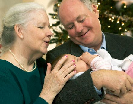 Lundberg_grandma_and_grandpa_holding_baby