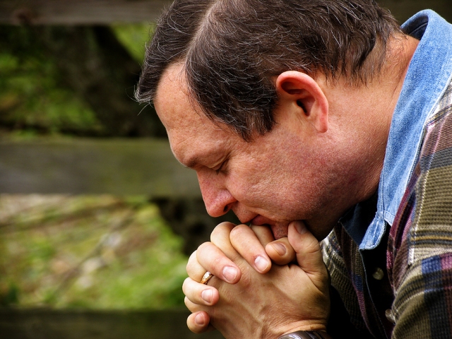 bigstock_Man_In_Prayer_240676
